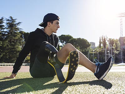 Young runner with prothesis