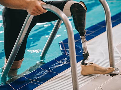 Swimmer with prothesis